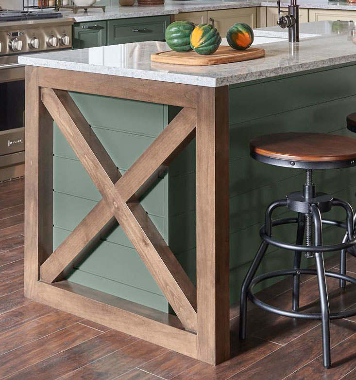 X-panel at the end of a green kitchen island. Photo provided by ACPI/Cabinetworks Group
